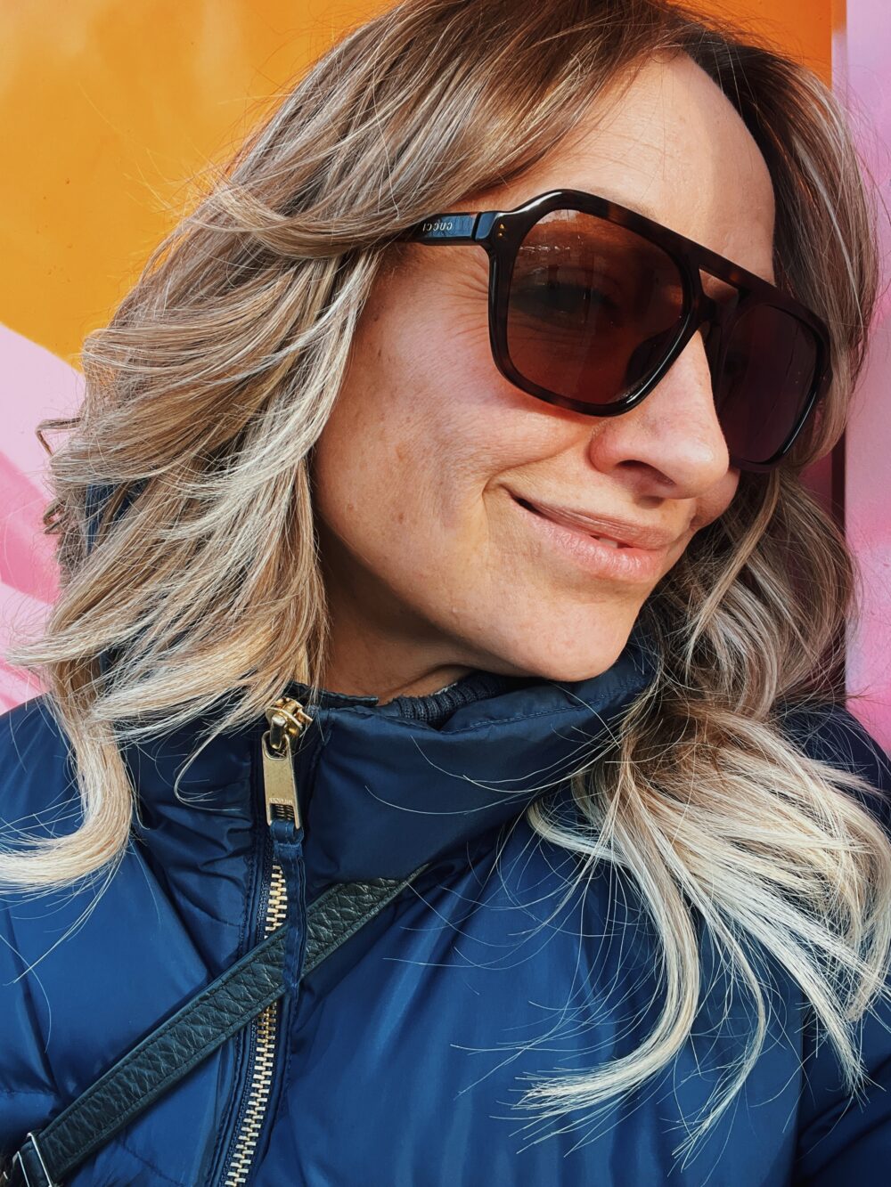 “Casie Stewart wearing Gucci sunglasses in winter Toronto”
“Gucci GG1823SA Asian Fit sunglasses close-up”
“Designer sunglasses styled with winter coat”
“SmartBuyGlasses Gucci packaging and dust bag”
