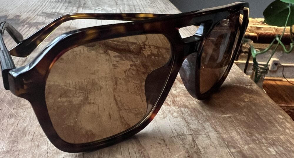 “Casie Stewart wearing Gucci sunglasses in winter Toronto”
“Gucci GG1823SA Asian Fit sunglasses close-up”
“Designer sunglasses styled with winter coat”
“SmartBuyGlasses Gucci packaging and dust bag”